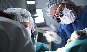 Dentists performing surgery