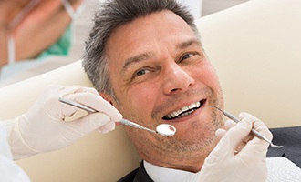Man smiling in the dental chair
