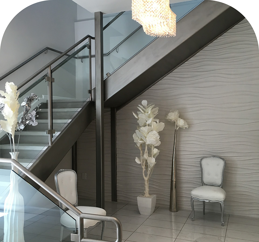 Staircase with a vase of white flowers in a dental office in Burbank