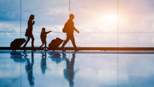 people running through airport