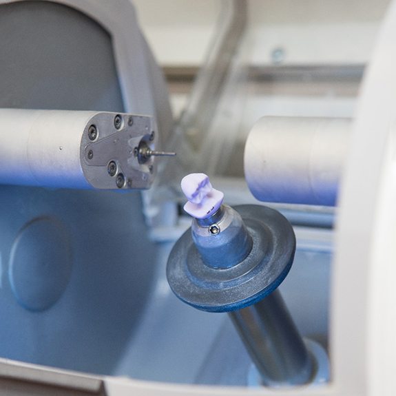 Close-up of machine used to mill CEREC dental crowns