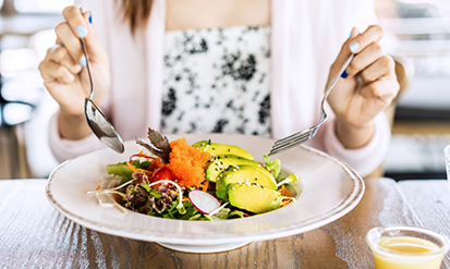 Woman eating a salad
