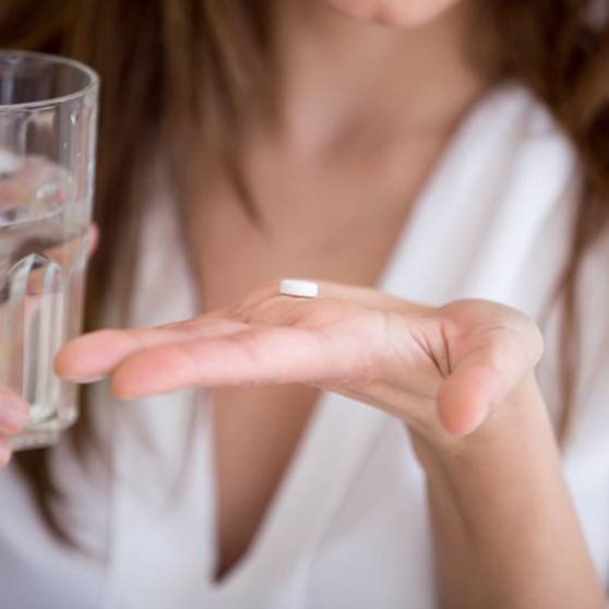 Lady takes pill