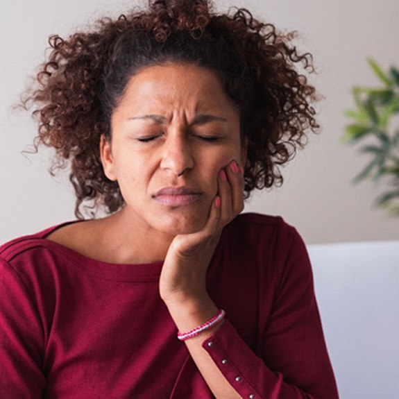 woman with root canal signs